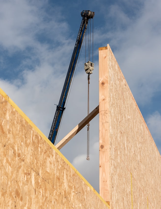 levage construction sur chantier bois